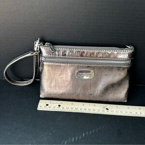 MK Clutch Purse Bronze in Color